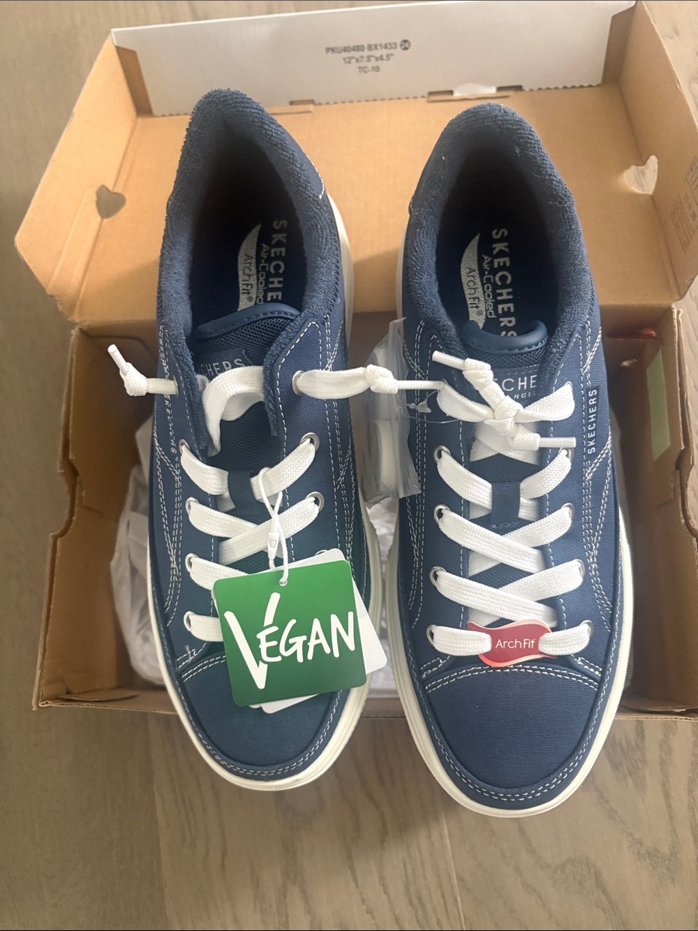 Skechers Navy and White Arch Fit Vegan Low-Top Sneakers